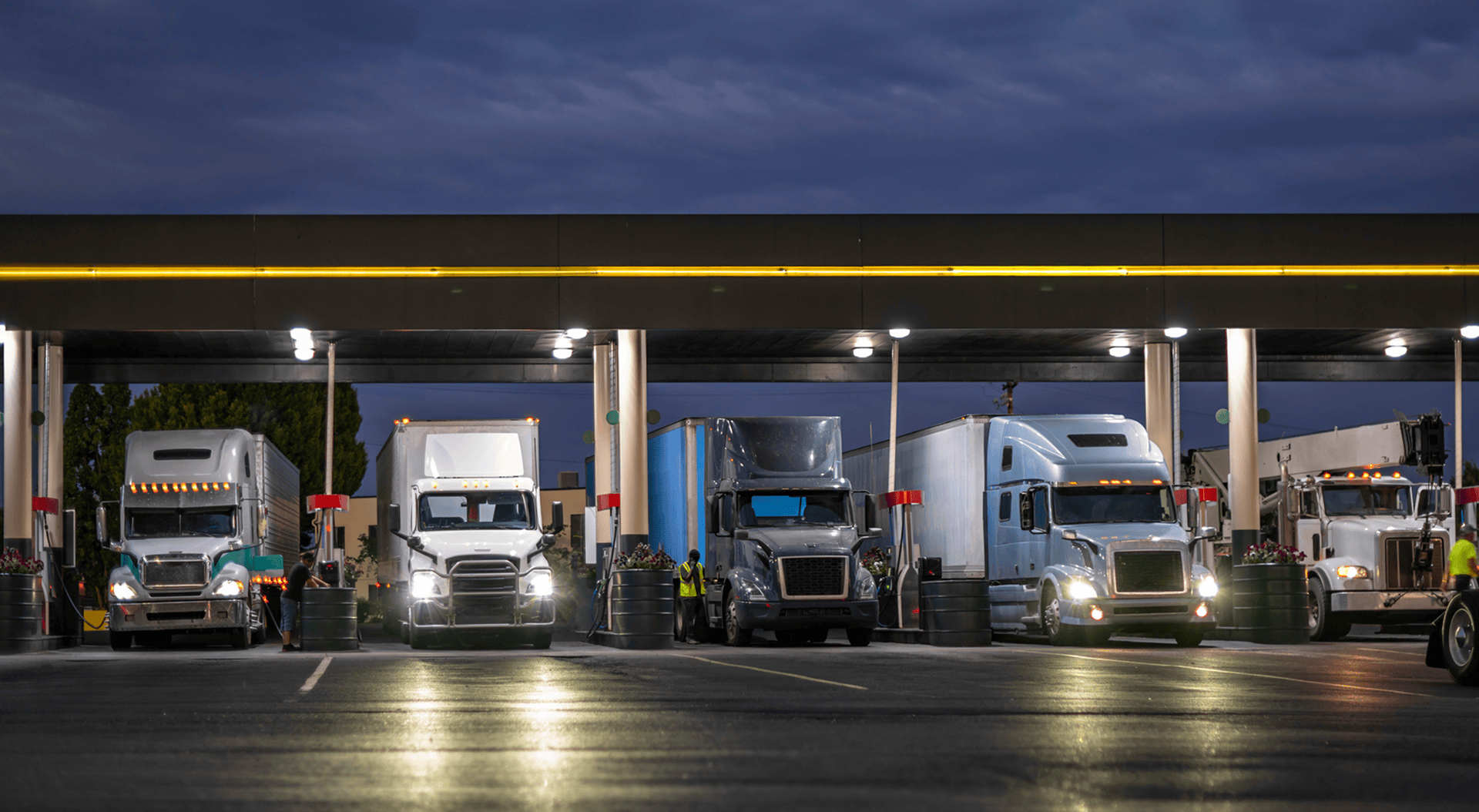 A cardlock commercial transport fleet parked at an automated fueling station
