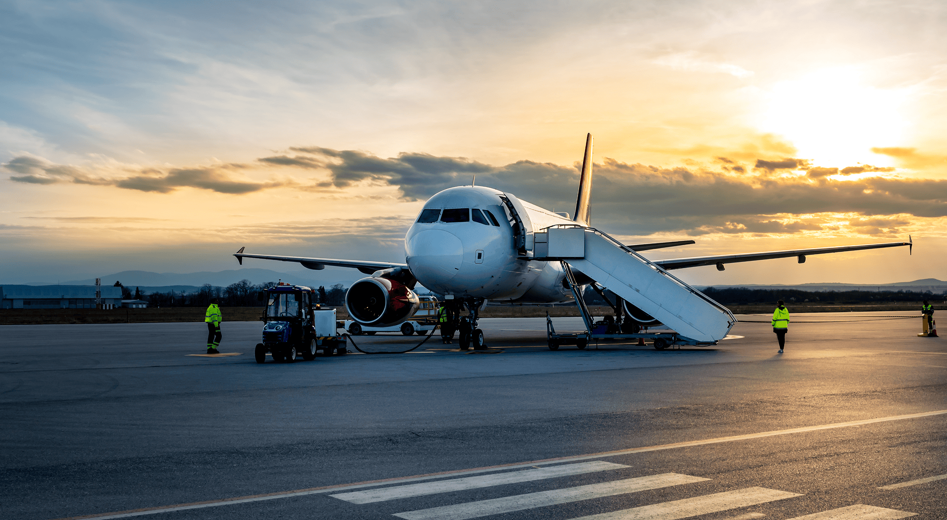 Commercial plane on airport ramp.
