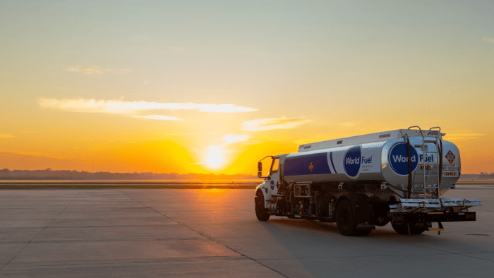 Fuel truck at sunset on runway