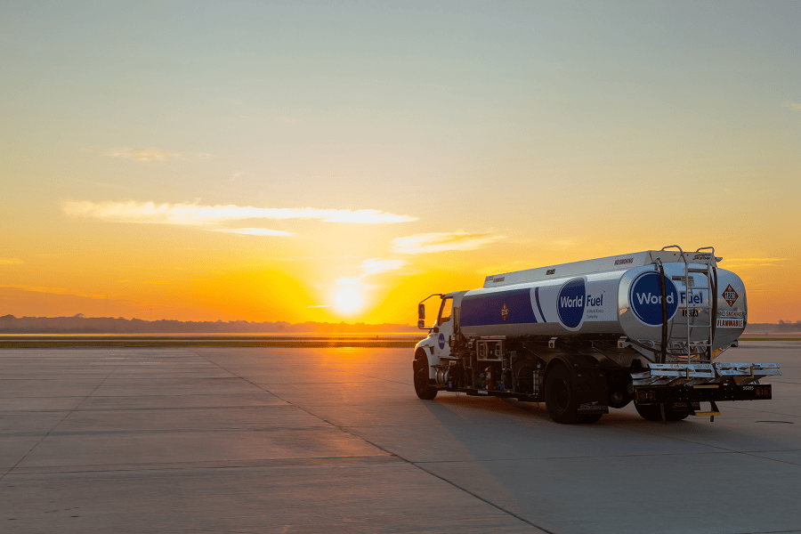Fuel truck at sunset on runway