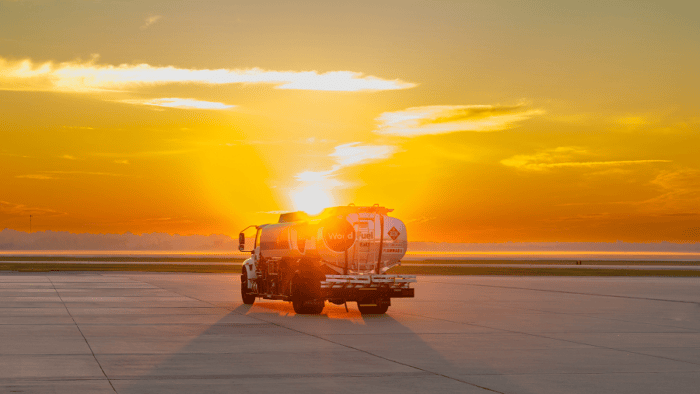Fuel truck against a stunning sunset.