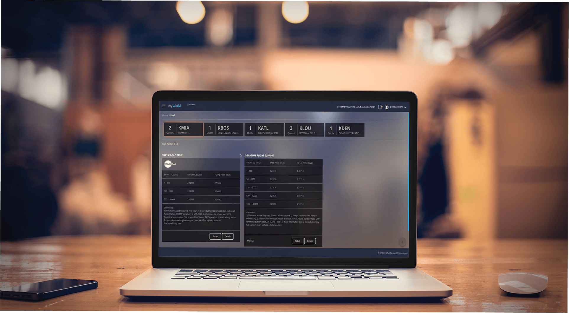 Laptop displaying data analysis interface.