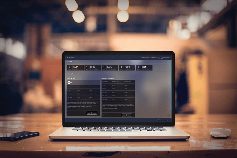 Laptop displaying data analysis interface.