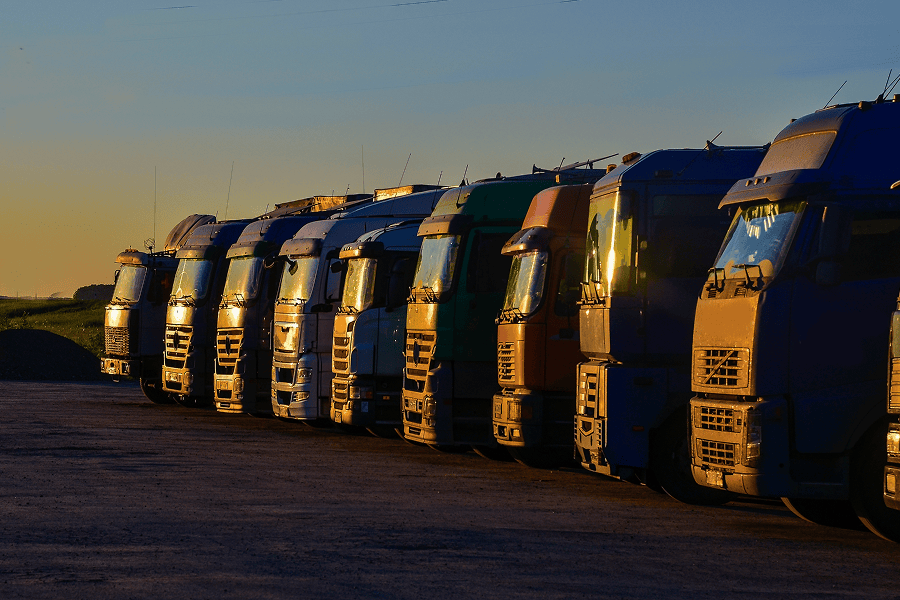 Trucks lined up at sunset.