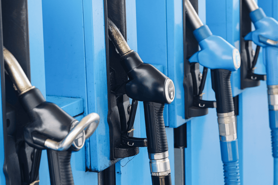 Various fuel nozzles on dispensers.