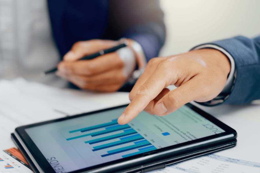 Business professionals analysing performance data.