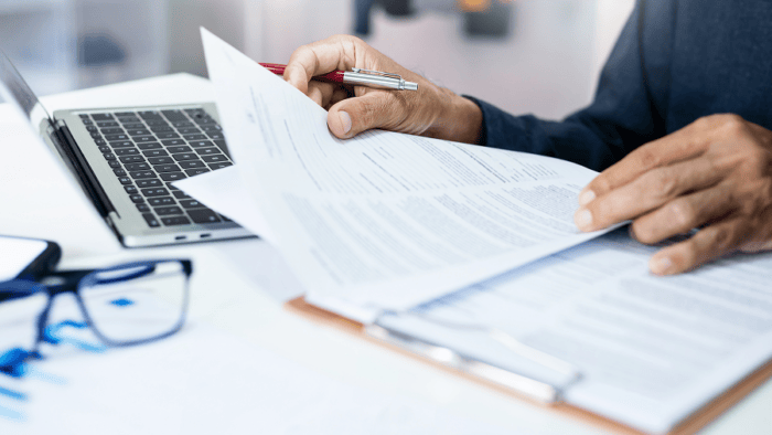 person reviewing documents