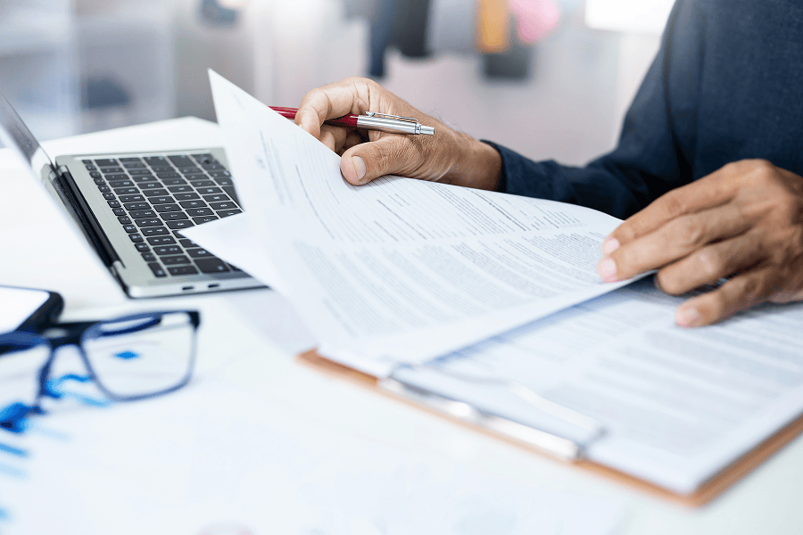 person reviewing documents