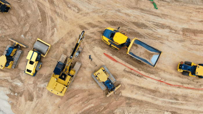 Aerial view of construction vehicles in a site
