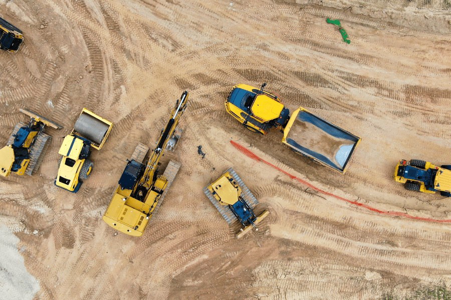 Aerial view of construction vehicles in a site