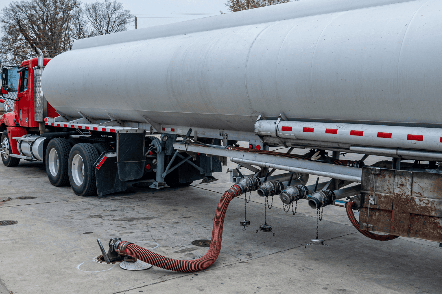 Commercial tanker fueling a gas station