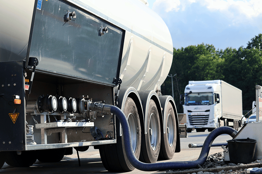 Tanker fueling a gas station