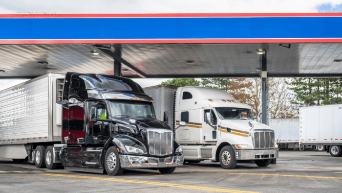 trucks at a fueling station