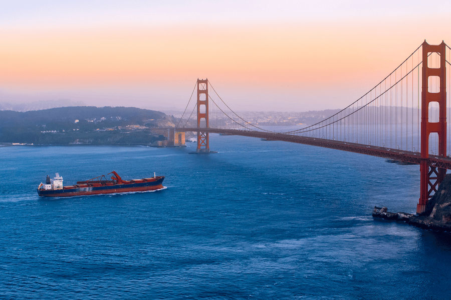 Golden Gate Bridge with ship passing