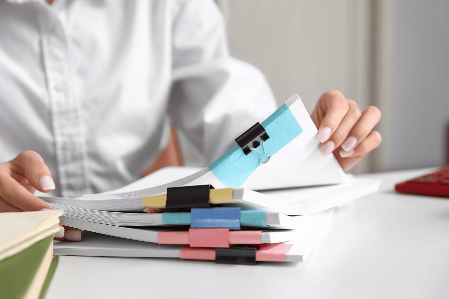 woman looking over documents