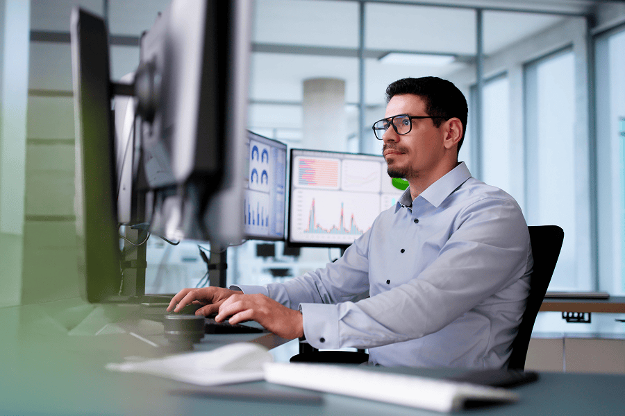 man looking at screen monitor