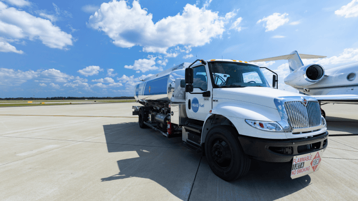 Fuel truck at airport runway.