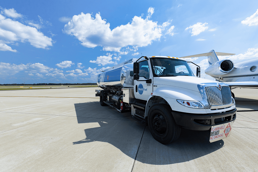 Fuel truck at airport runway.