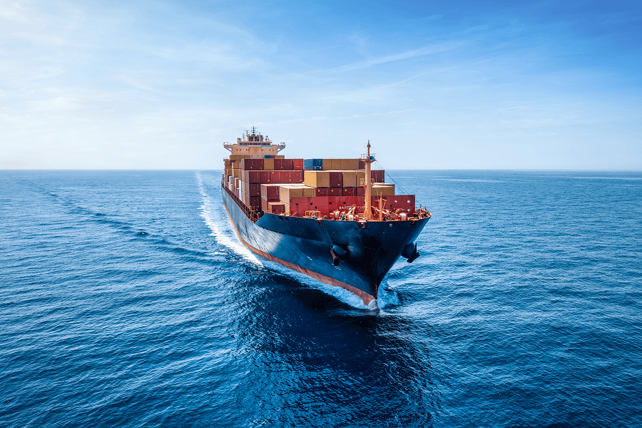 Large cargo ship navigating open waters