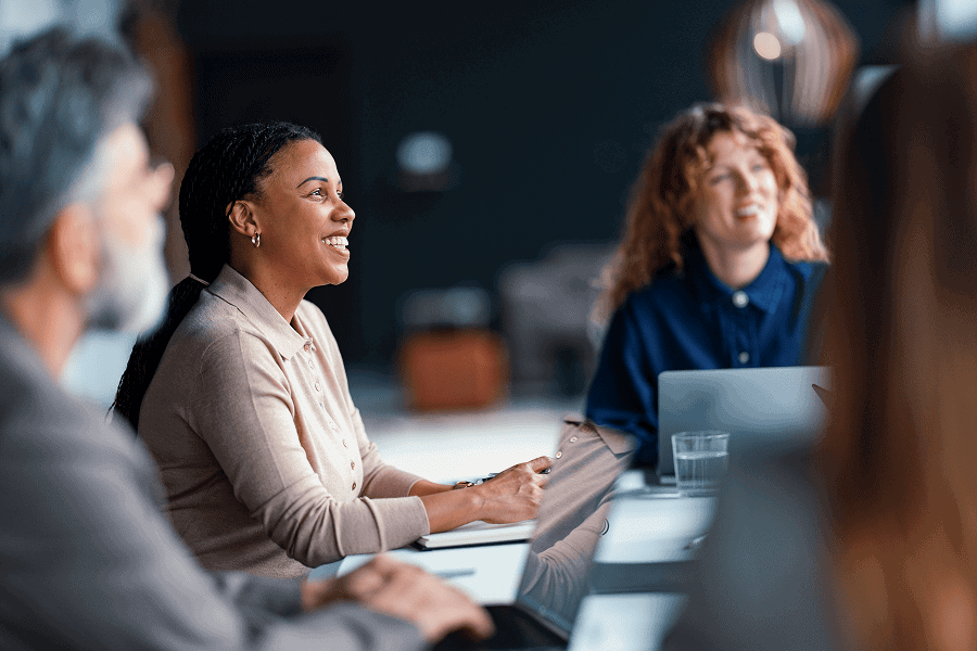 A business meeting with diverse professionals collaborating inside an office