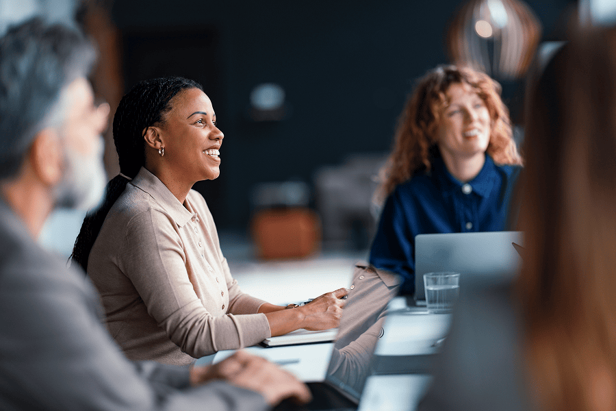 A business meeting with diverse professionals collaborating inside an office