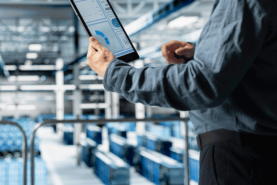 Admin monitoring data on tablet device.