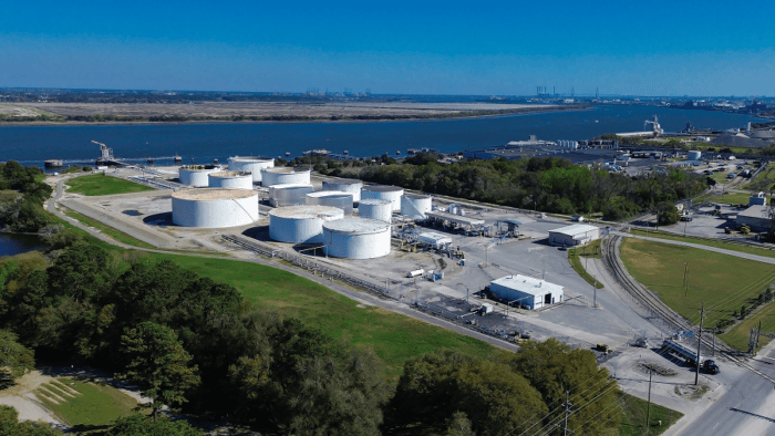 Industrial tanks by a river