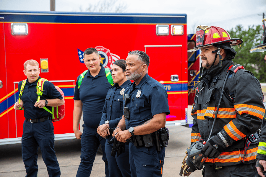 Emergency responders in front of ambulance