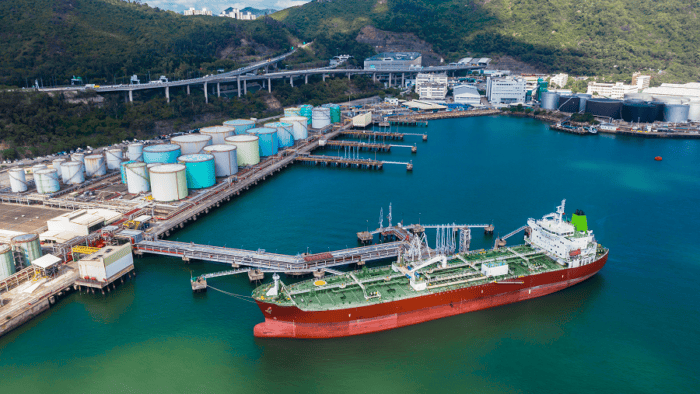 A specialized bunker fuel vessel docked at a port terminal terminal
