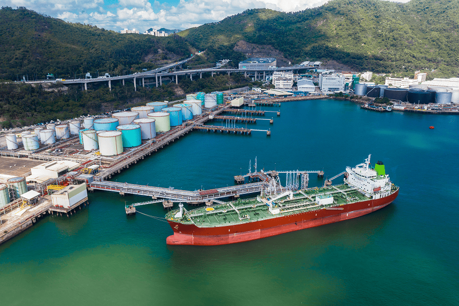 A specialized bunker fuel vessel docked at a port terminal terminal