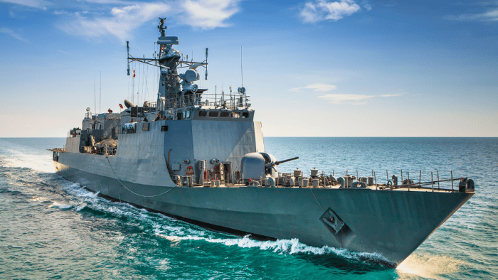 A naval operations vessel conducting maritime patrol maneuvers