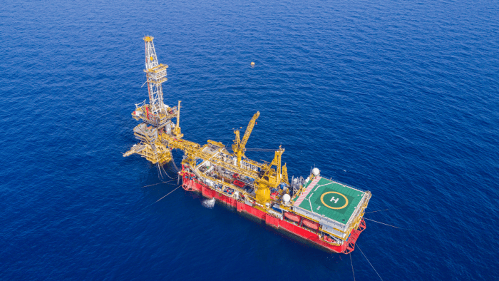 An offshore oil rig operating at sea