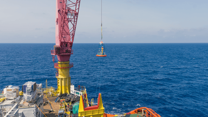An offshore oil rig operating at sea