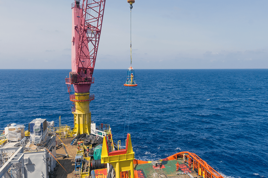 An offshore oil rig operating at sea