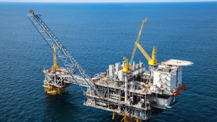 An offshore oil rig operating at sea