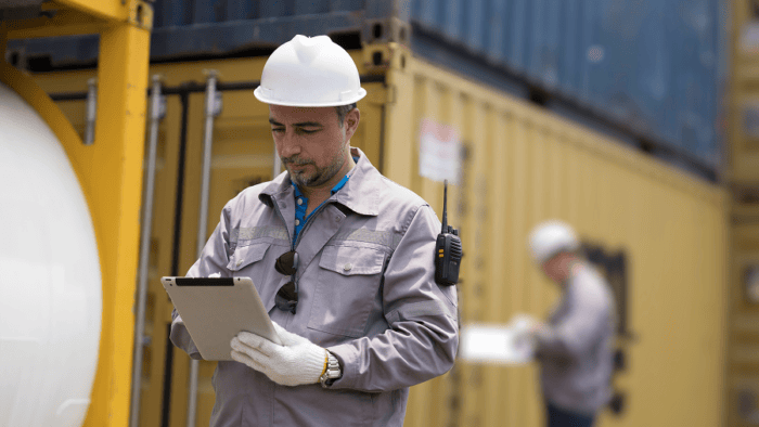 Workers on site containers
