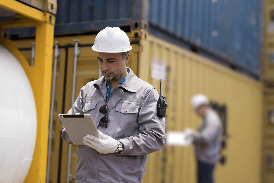 Workers on site containers