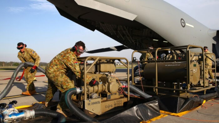 A defuel and refuel trial being conducted on a C-17 Globemaster III aircraft.