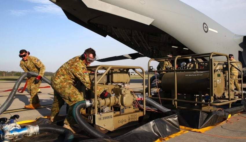 A defuel and refuel trial being conducted on a C-17 Globemaster III aircraft.