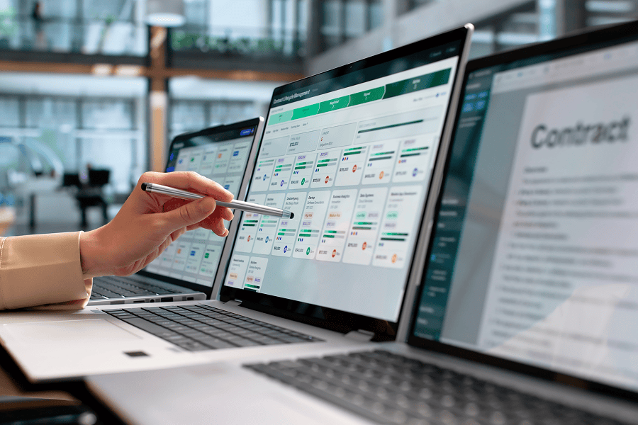 Person reviewing contract management software interface.