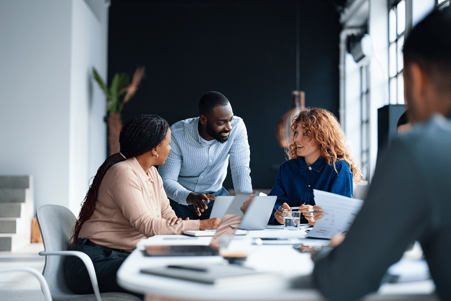 A professional team collaborating around a table