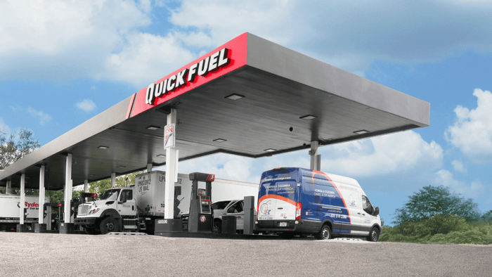 Fuel station with trucks and vans.