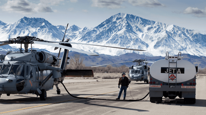 Refueling operations being conducted on US Navy Seahawk helicopters