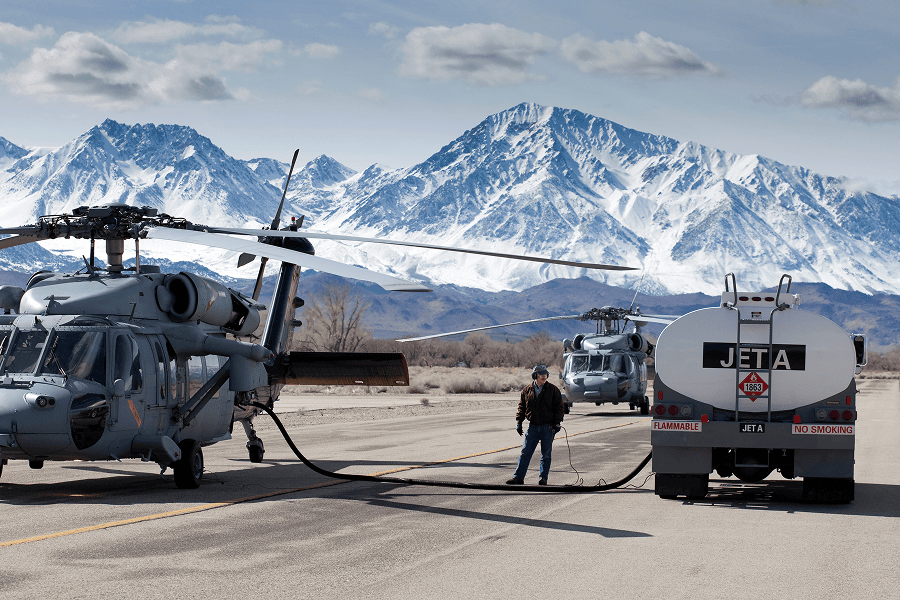 Refueling operations being conducted on US Navy Seahawk helicopters