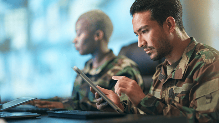 An army specialist using a digital tablet