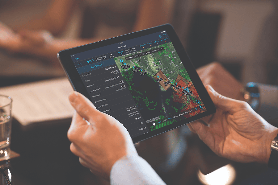Person using tablet for flight planning