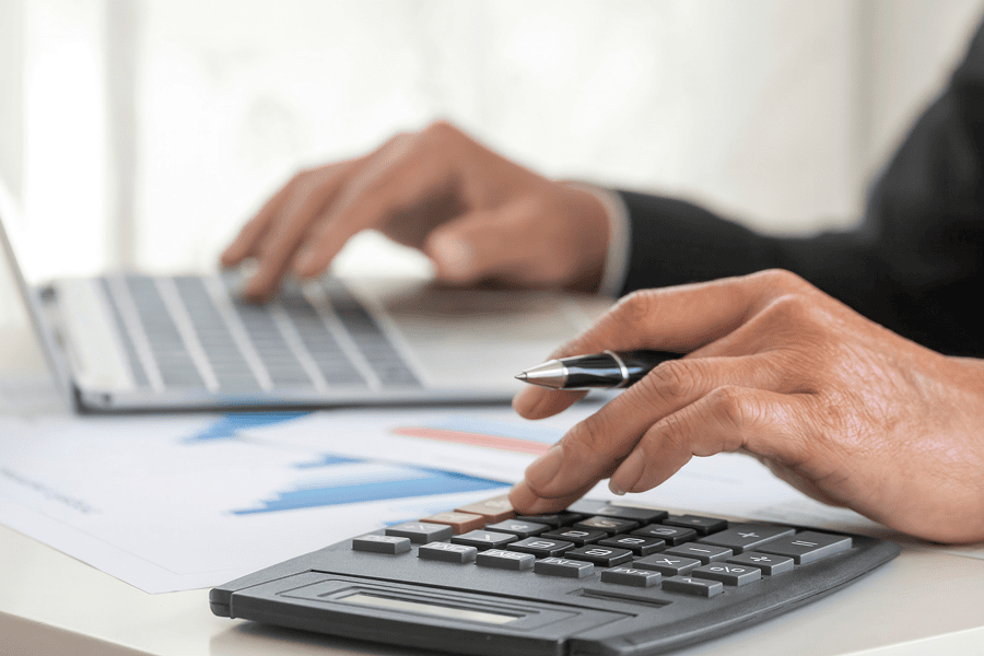 man using calculator