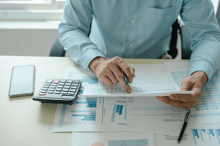 man looking over expenses