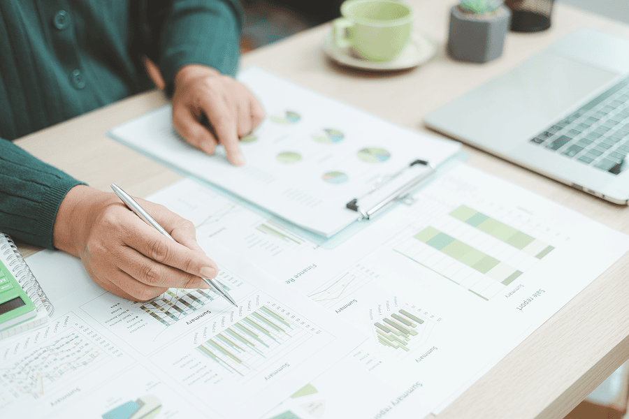 person looking at charts