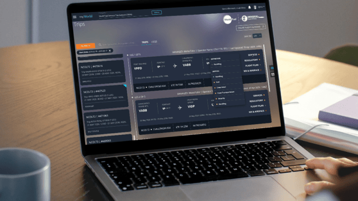Laptop displaying travel itinerary interface.